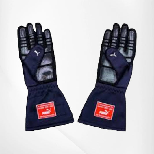 Pair of navy blue racing gloves with red Puma labels on a white background