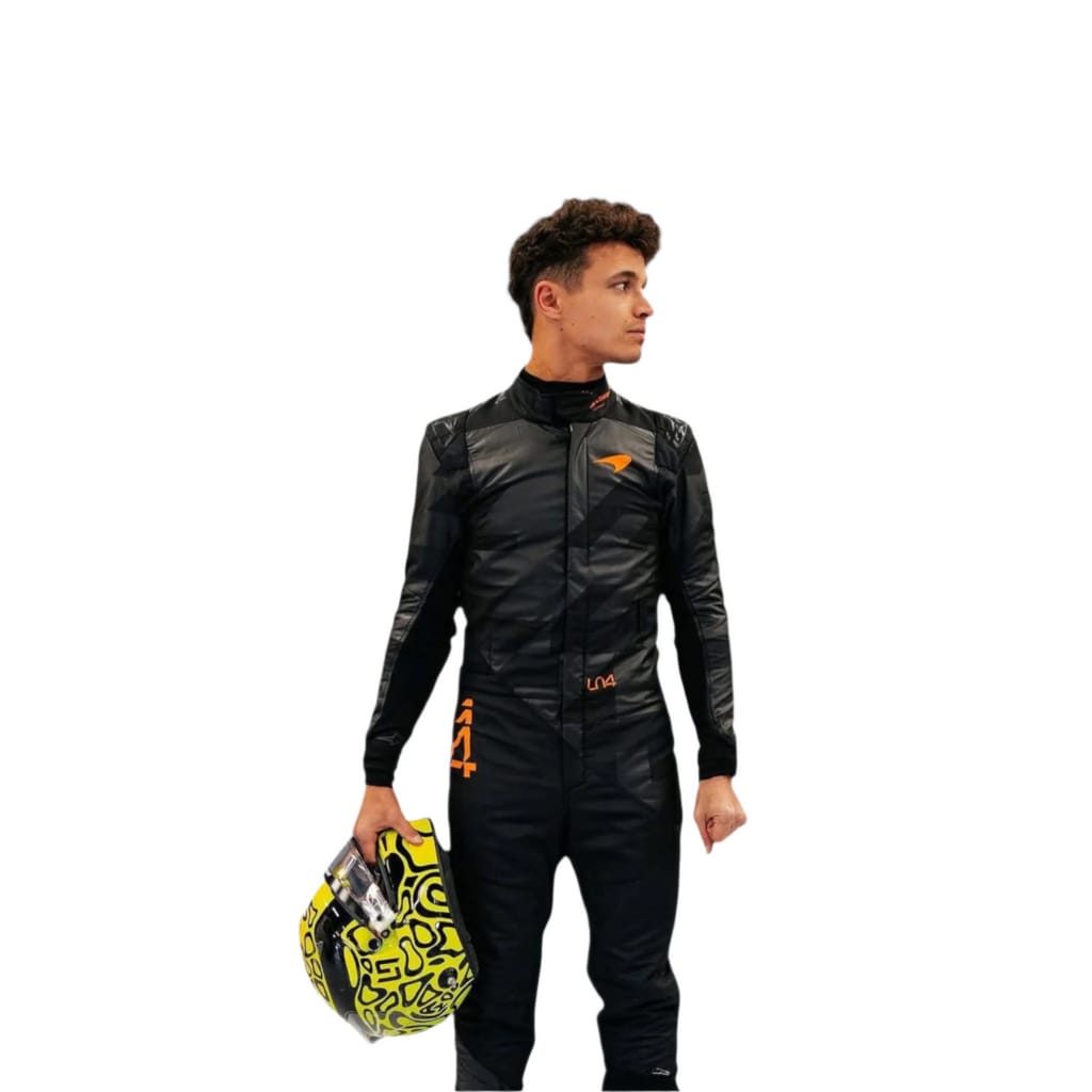 F1 Go Kart  Lando Norris 2025 McLaren race suit Person wearing a black racing suit with orange accents, holding a helmet on a white background
