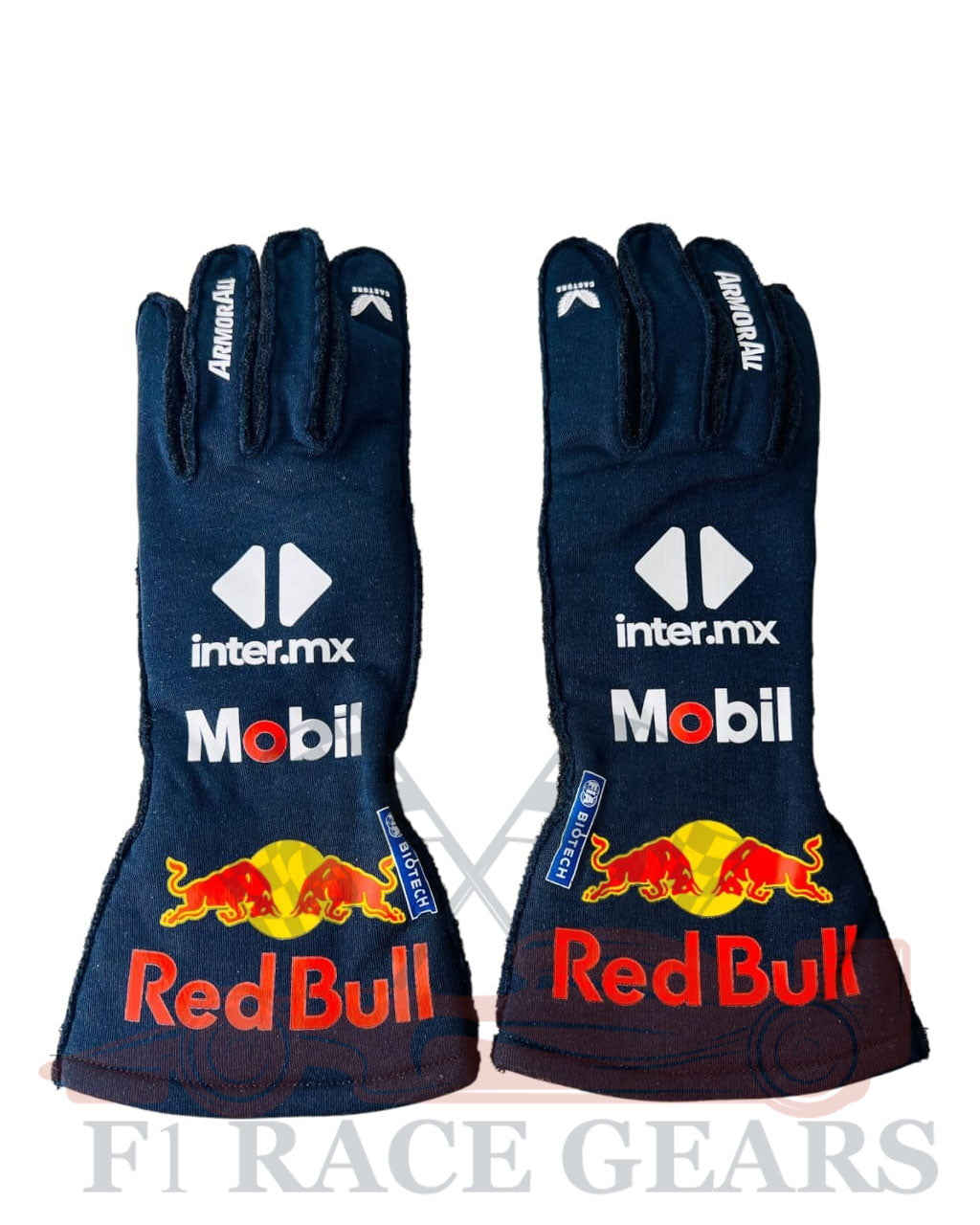 Pair of racing gloves with Red Bull and Mobil branding on a white background